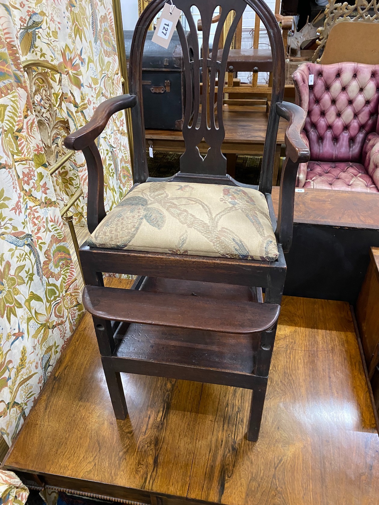 A 19th century mahogany child's chair on stand, width 94cm